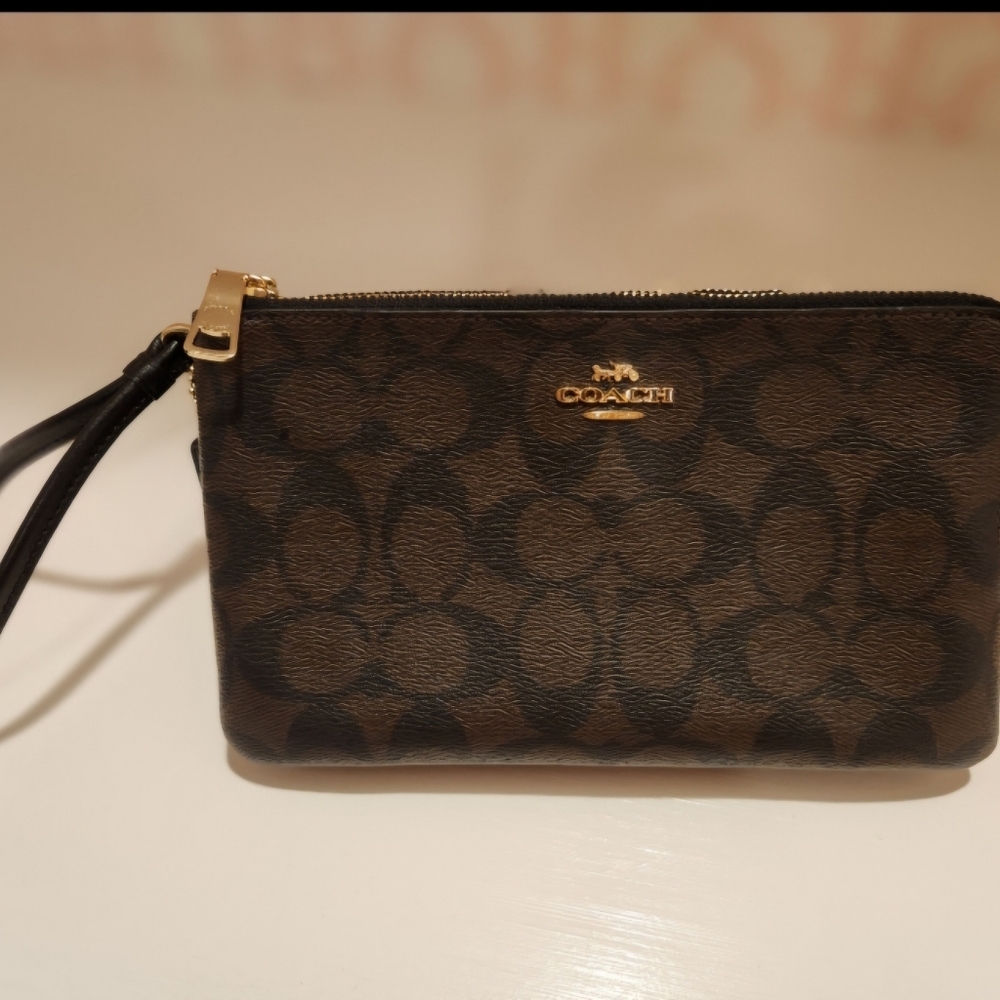 Coach purse with matching wallet.